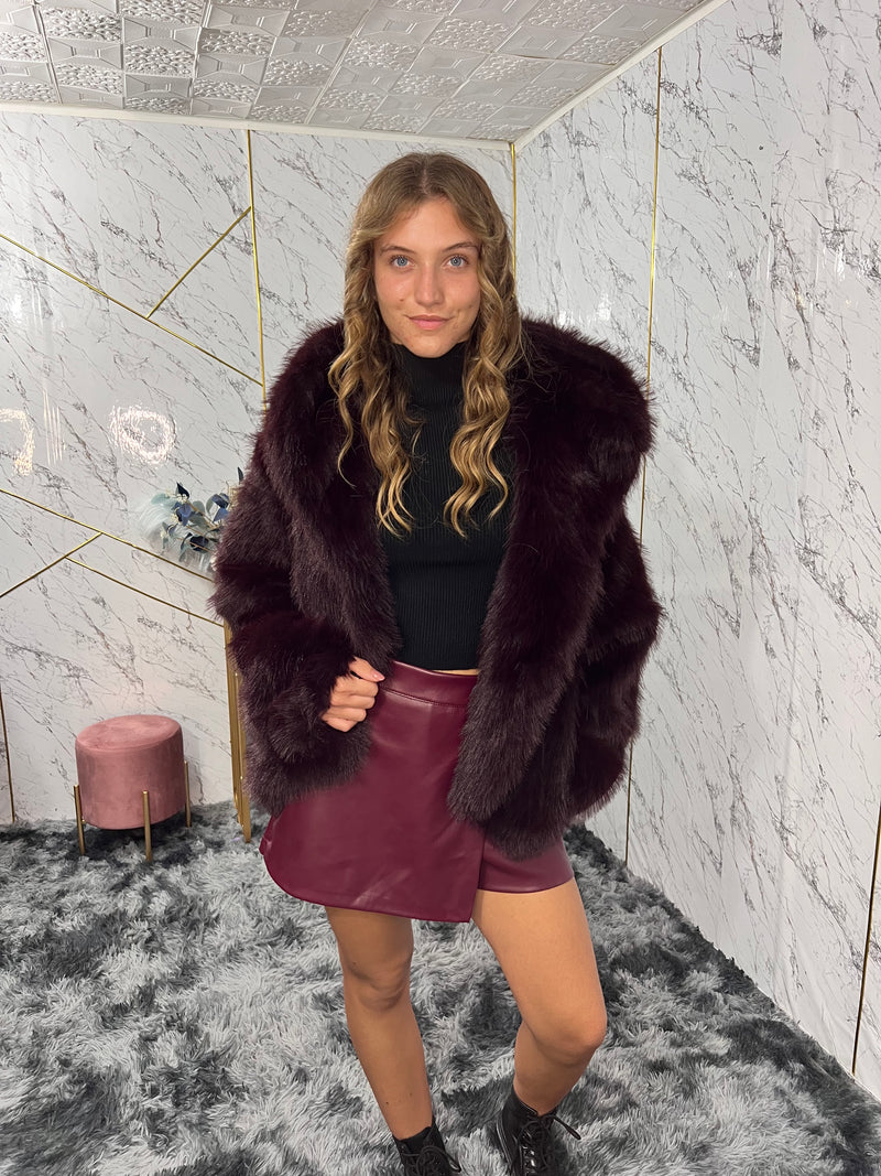 Pellicciotto con cappuccio oversize